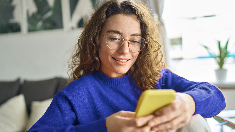 A woman with a smartphone in her hands